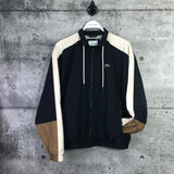LACOSTE :  Veste Lacoste zippée Imperméable, Bleu Marin/ Brun/ Blanc