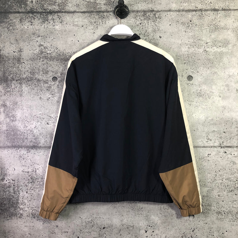 LACOSTE :  Veste Lacoste zippée Imperméable, Bleu Marin/ Brun/ Blanc